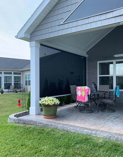 Commercial awnings extended outside a coffee shop.